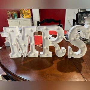 Light up decor. “Mrs.”